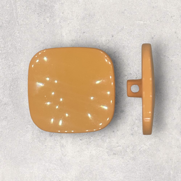 Orange kvadratisk plastknap, 1 øje 26x26mm