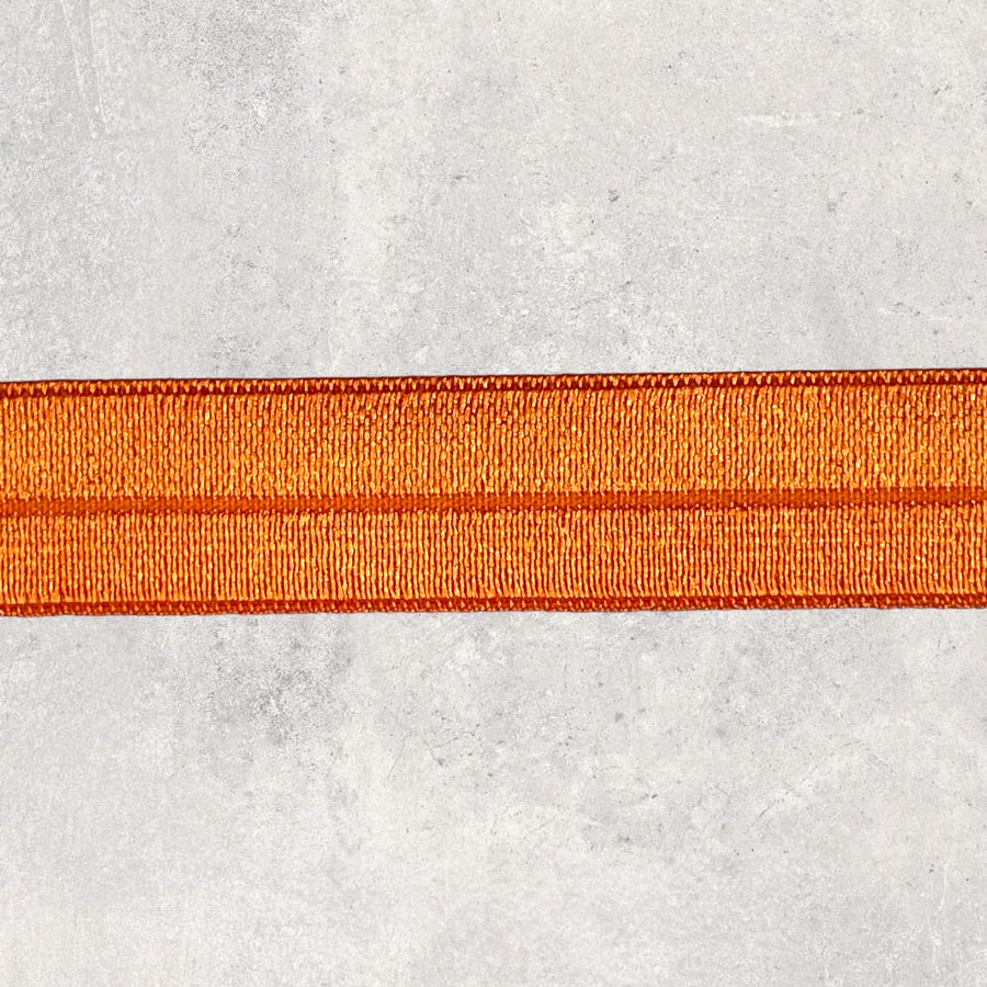 Foldeelastik, orange blank, 15mm, 1m
